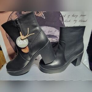 Mia McKenna boots